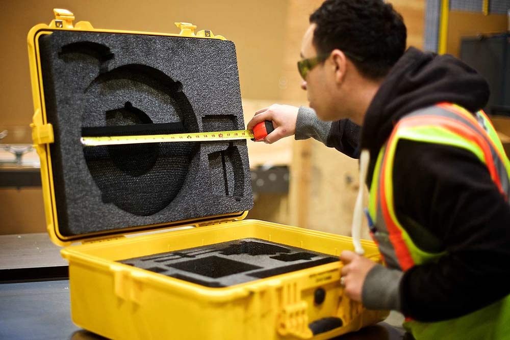 custom-heavy-duty-plastic-transit-cases-being-measured-for-precision