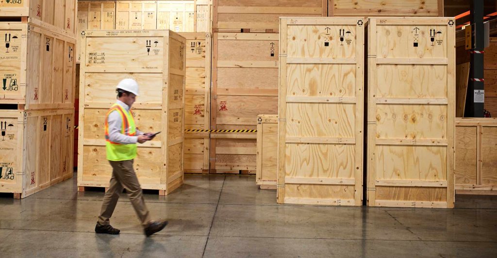 transpak-executive-manager-walking-through-warehouse