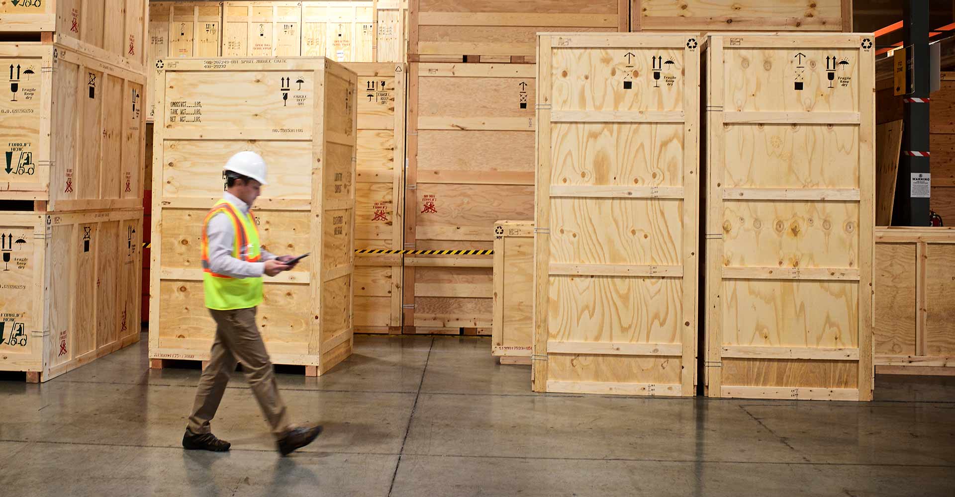transpak-executive-manager-walking-through-warehouse