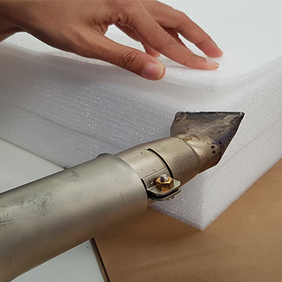 Detailed view of custom foam packaging pieces at TransPak.