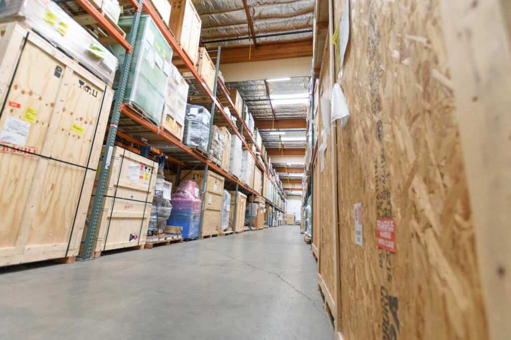 transpak warehouse filled with materials and crates